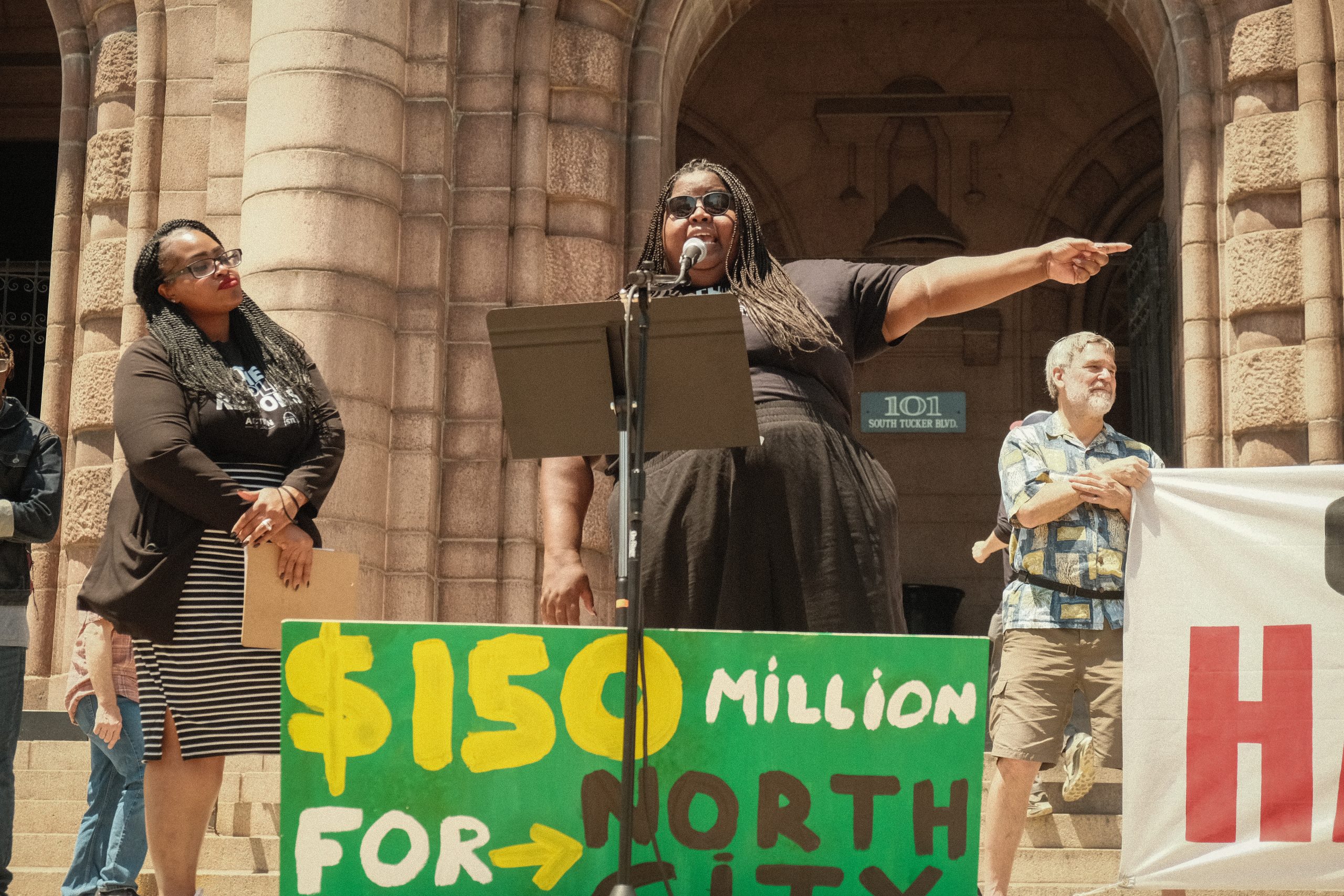 Protesters rally outside City Hall for a bigger share of Ram’s Settlement money
